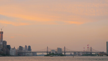 Fototapeta premium landscape of manhattan and queensboro bridge sunset time 