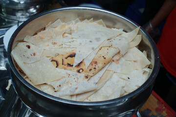 Appam, Palappam,Kallappam,vella appam,parotta,Roti or Chapati a popular traditional Kerala breakfast food.
