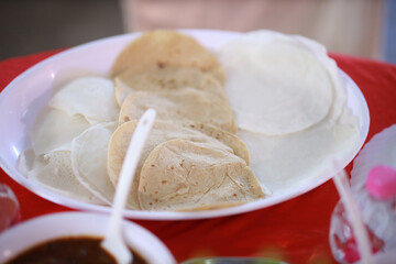 Appam, Palappam,Kallappam,vella appam,parotta,Roti or Chapati a popular traditional Kerala breakfast food.