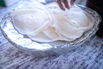 Appam, Palappam,Kallappam,vella appam,parotta,Roti or Chapati a popular traditional Kerala breakfast food.
