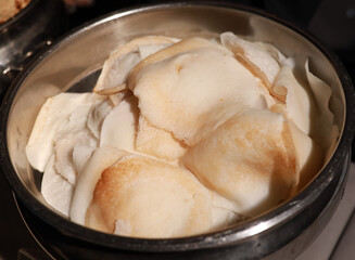 Appam, Palappam,Kallappam,vella appam,parotta,Roti or Chapati a popular traditional Kerala breakfast food.