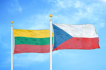 Fototapeta na wymiar Lithuania and Czech Republic two flags on flagpoles and blue sky