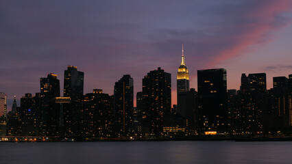 Fototapeta na wymiar landscape of mid town manhattan NYC evening time 