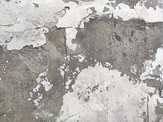 Grey Concrete Texture old wall with peeling paint, scratches and cracks