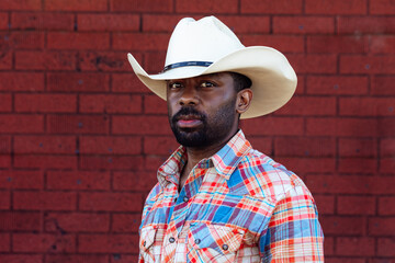 Portrait of millennial generation farmer and cowboy