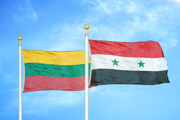 Lithuania and Syria two flags on flagpoles and blue sky