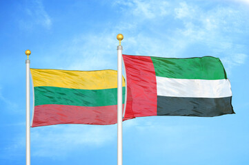 Lithuania and United Arab Emirates two flags on flagpoles and blue sky