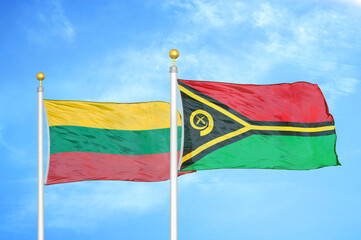 Lithuania and Vanuatu two flags on flagpoles and blue sky