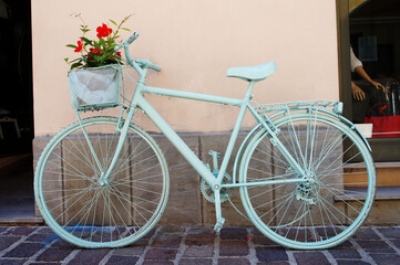 vintage bicycle with flowers in the street