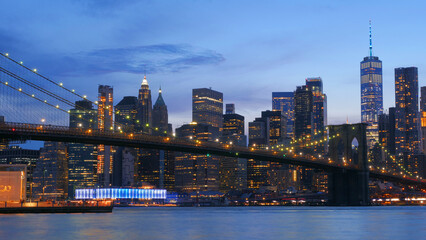 landscape of lower manhattan with Brooklyn bridge  east river at night time