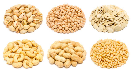 Set of nuts and seeds - pistachio nuts in the shell, chickpea seeds without shell, pumpkin seeds in the shell, raw cashew seeds without shell, peanut in the shell, peeled pine nut kernels