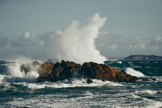 waves crashing on rocks