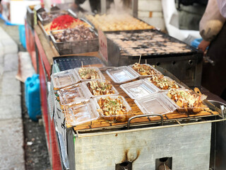  Takoyaki japanese food on the street to Fushimi Inari shrine at Kyoto,Japan.