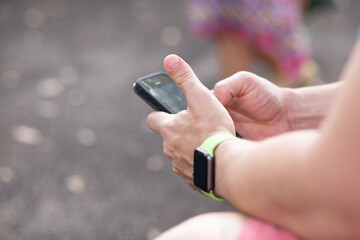 hand with mobile phone