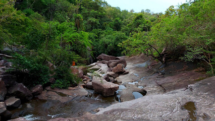 waterfall in a river with silk teepee water