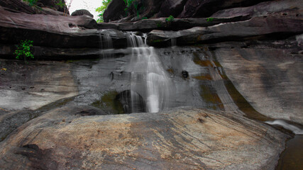 waterfall in a river with silk teepee water