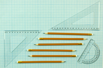set of stationery for design and drawing. simple pencil, set of rulers and protractor. place for text
