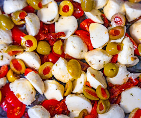 Food Close Up - Green Olives, Mozzarella Balls, Tomatoes, Sundried Tomatoes, Olive Oil Salad