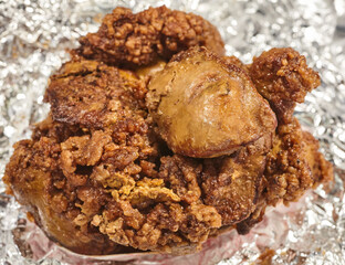 Deep fried chicken livers, an American soul food classic, shown here wrapped for takeout at a stand in York, Pennsylvania, USA