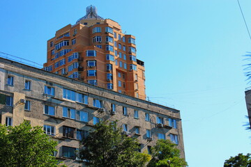 old and new high-rise building