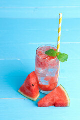 Drinks of summer watermelon mix soda with watermelon sliced, and mint leaves. A cold refreshing drink for healthy.