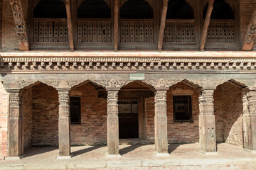 Naklejka premium Wood carving details of doors and windows at Patan Durbar Square, Patan, Nepal the World Heritage site declared by UNESCO