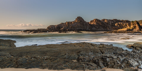 Winter at the bay - a panorama seascape with rock formations