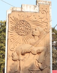 statue of a  sacrifice of son of mother for native language