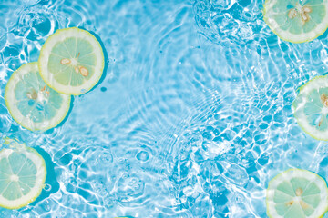 Fototapeta na wymiar Sparkling ripples of lemonade from summer ice