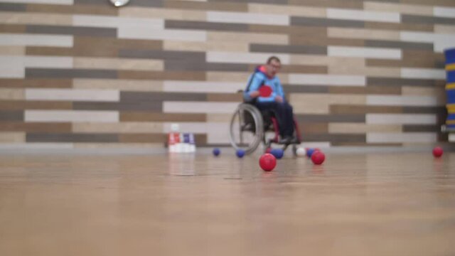Paralympic sport playing boccia slow motion