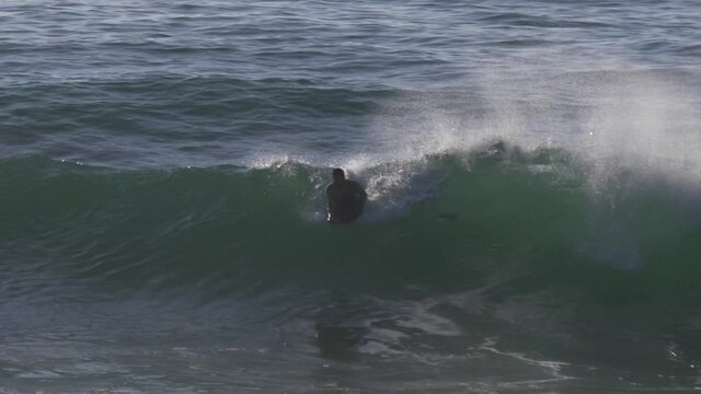 water sport bodyboard in beach slow motion