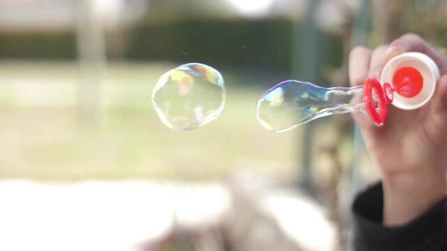 making soap bubbles slow motion