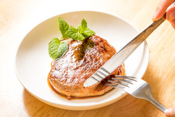 A fine steak dinner on a wood-grain table
