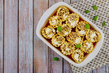 Stuffed pasta rolls with meat and ricotta cheese.