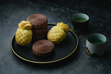 Delicious pastry, pineapple and cocoa. Delicious pineapple crisp and chocolate cake. Traditional pastry, pineapple cake and chocolate pastry.