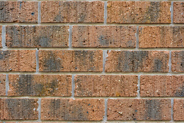 close up of old red brick wall background texture