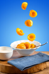 Fresh peaches in syrup in the bowl