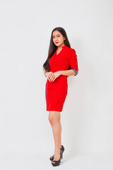 Young beautiful business woman in red dress