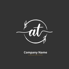 A T AT Initial handwriting and signature logo design with circle. Beautiful design handwritten logo for fashion, team, wedding, luxury logo.