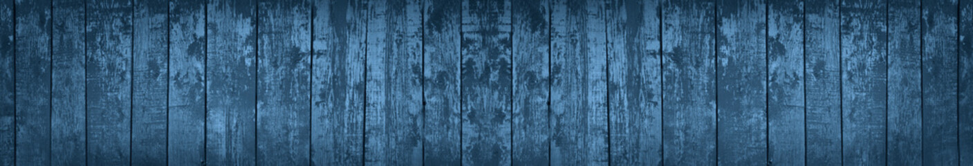 Dark blue grunge background. Long banner with vintage wood texture. Navy blue old wooden background.