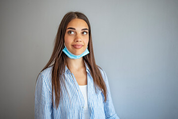 The woman wear the face mask wrong. Wearing a face mask won't protect from contracting COVID-19....