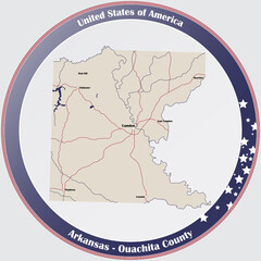 Round button with detailed map of Ouachita County in Arkansas, USA.