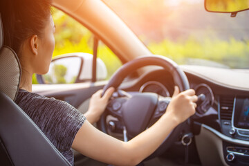 Fototapeta premium Female drivers drive cars