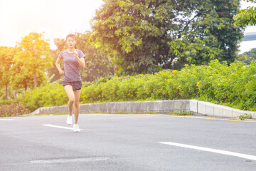 Young women run for fitness in the morning