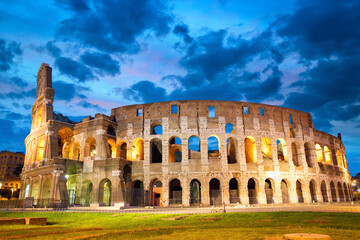 Fototapeta na wymiar Colosseum or Coliseum in Rome at dusk, Italy