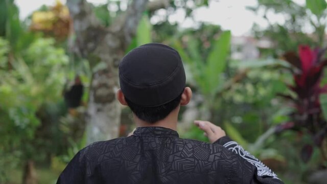 Religious Muslim man praying to God For praise and glorify Allah Concept of Muslim people praying