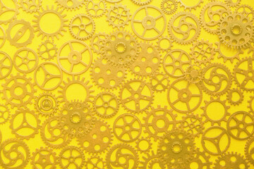 Background, an abstraction of a gear on a yellow background.