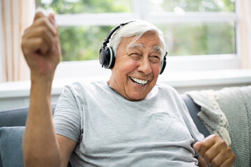 Smiling Older Senior Listening Music