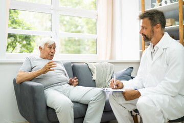 Home Care Elder Patient Talking To Doctor