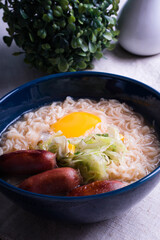 ramen with egg yolk and Japanese hotdog